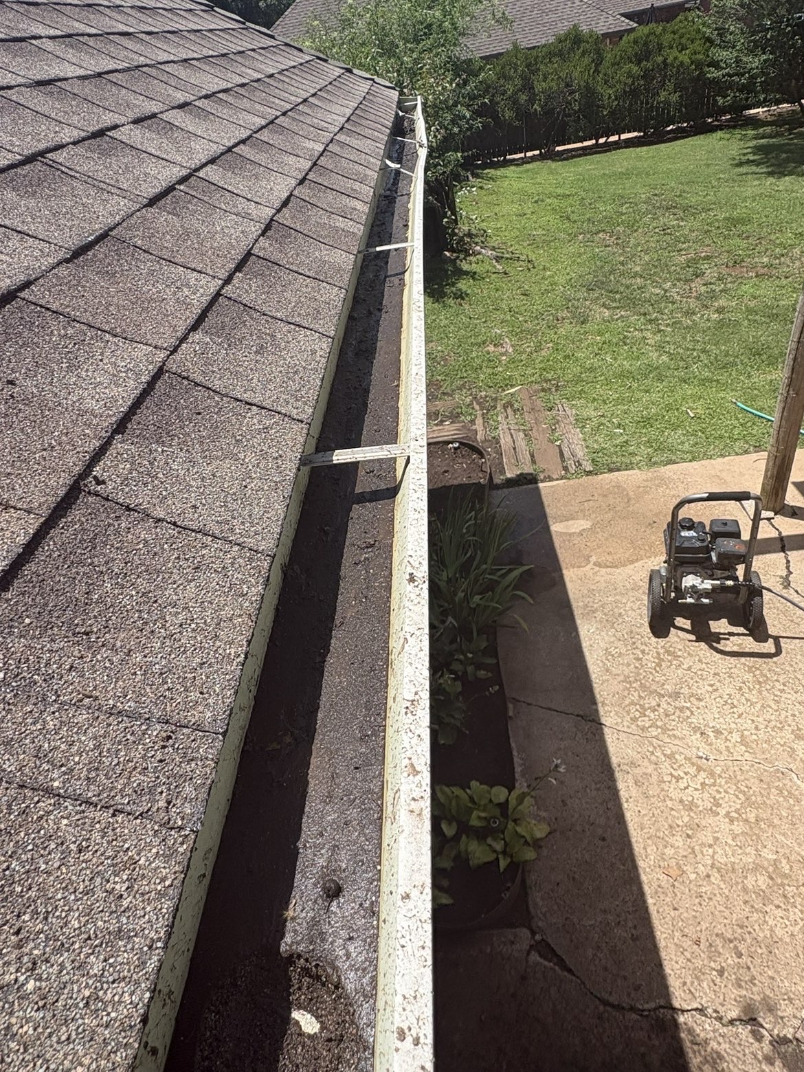 Gutter Cleanout — before